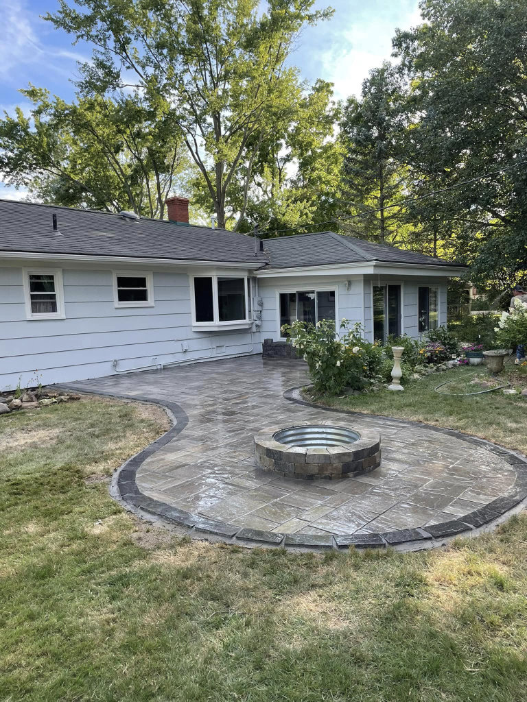 Greener Grounds Landscape brick firepit and patio.