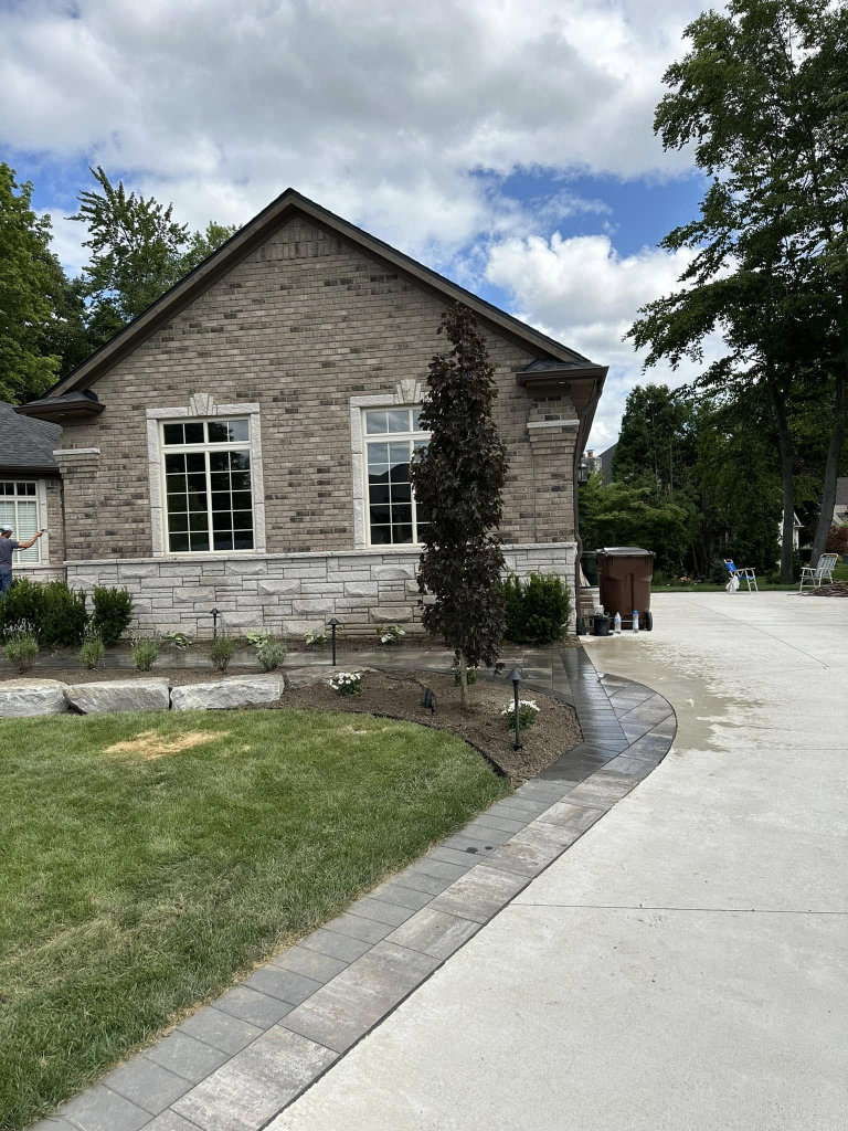 Greener Grounds Landscape stone and brick walkway and landscaping.