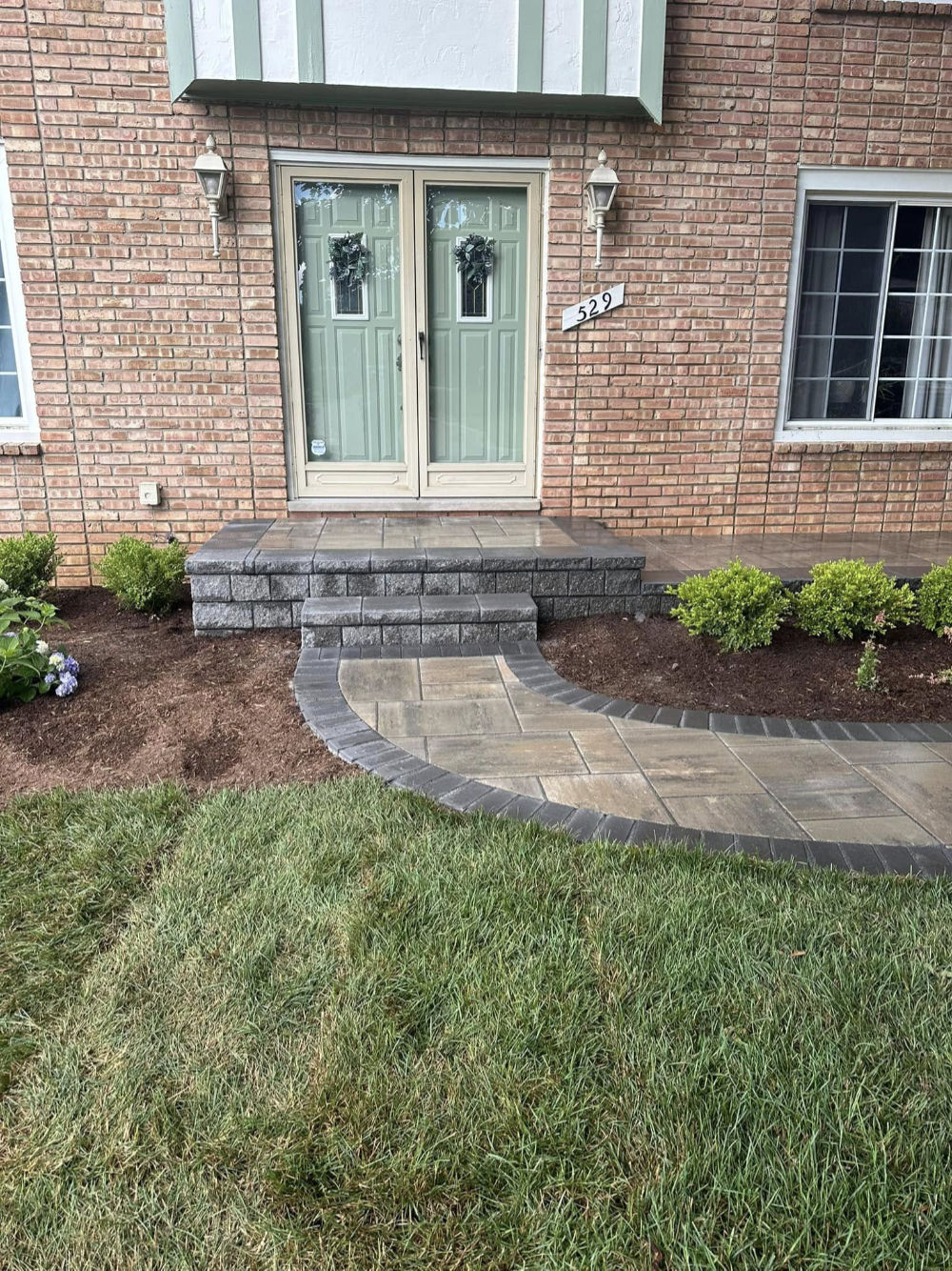 Greener Grounds Landscape brick walkway and landscaping.